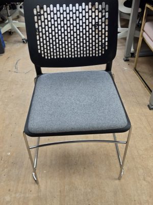 Grey and black stacking chair